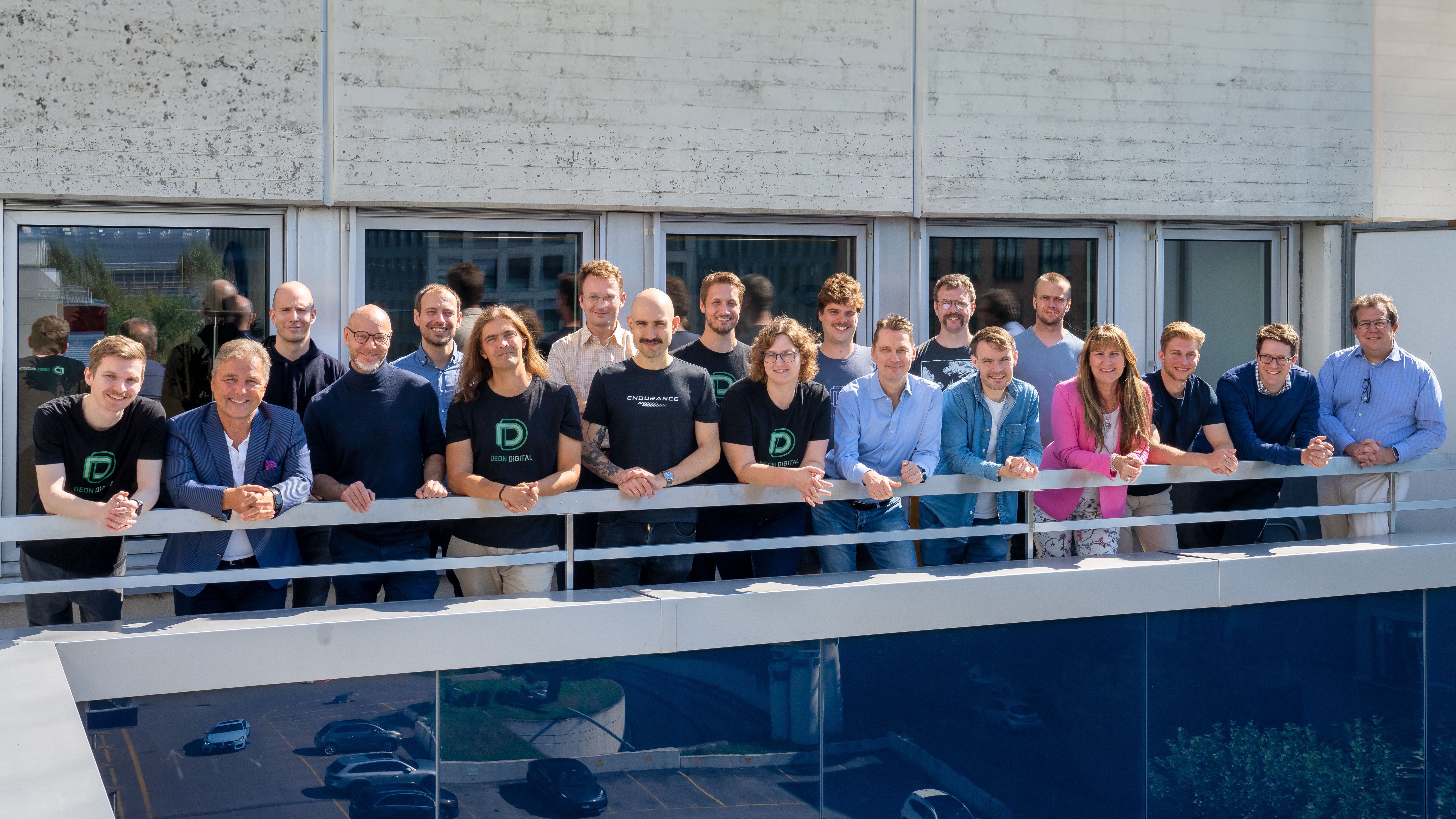 Deon Digital team on the office balcony